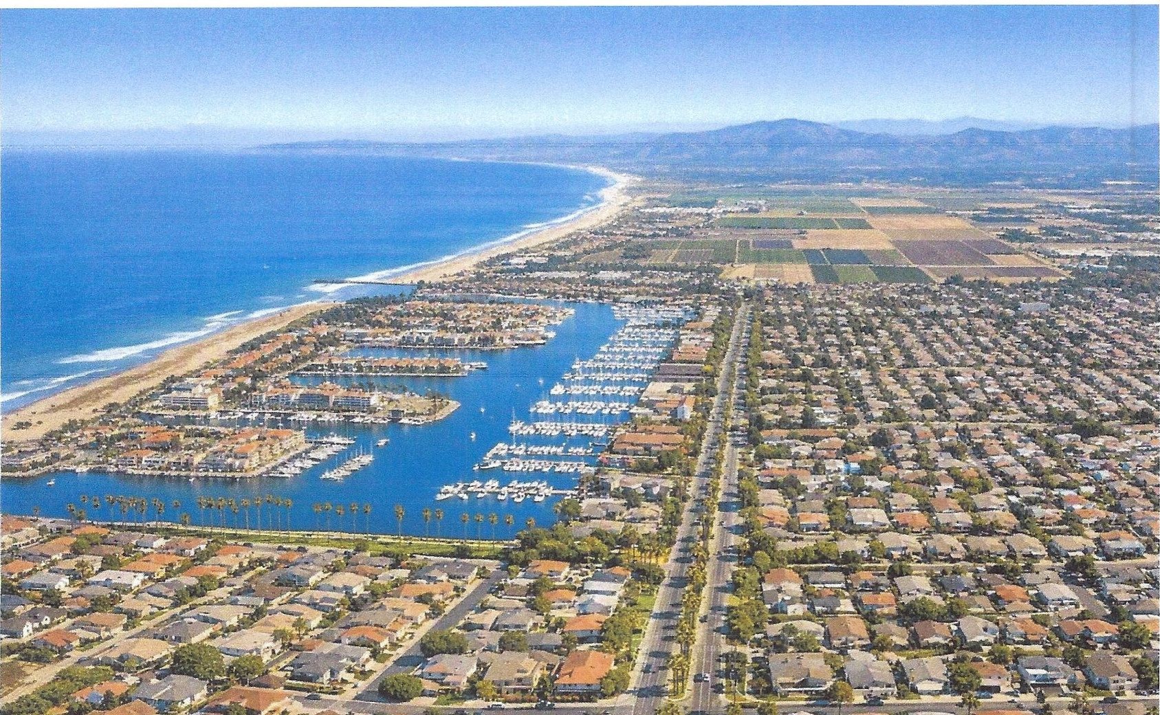 Aerial view of Oxnard, California coastline and marina